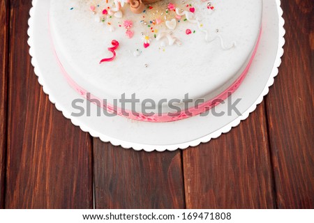 Flower themed cake. Fondant cake. Holiday cake/Cake on picnic table