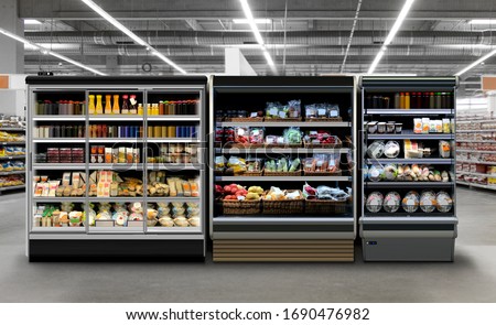 Commercial refrigerators different types of fridges. Photo, mock-up, Planogram. Juice, coffee and yoghurt in bottles and cans. Fresh Vegetable, sandwiches, fruits in plastic bottles at supermarket. 