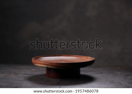 Wooden Tableware,flat wooden tableware placed on grey textured background.