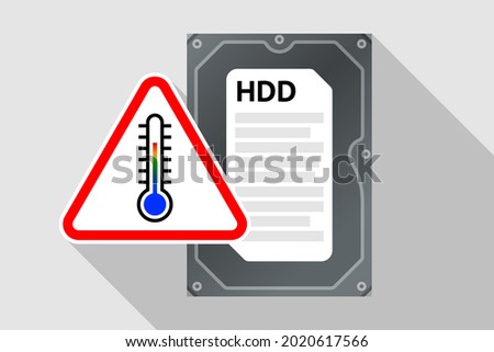 Hard disk drive and warning triangular sign with thermometer icon inside. Concept of operating temperature of HDD, optimal and critical temperature, overheating and risk of failure