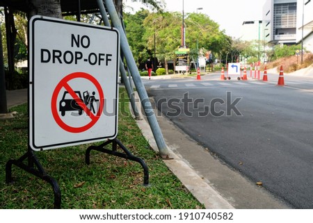 Image, Stock Photo Writing: Caution gate, stands for safety, warning on the floor of the parking lot, in front of a garage with white sheet metal gate with handle. Warning for car, bicycle, pedestrian, against accident, danger, collision with garage door, when opening or closing the door.