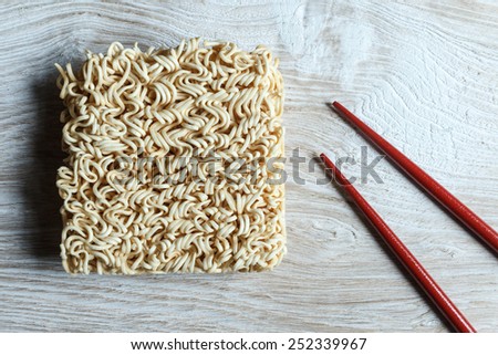 Instant noodle with chopstick.