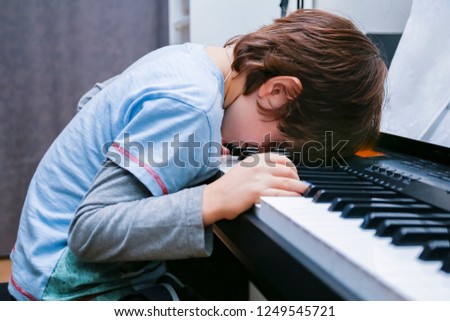 Similar – Image, Stock Photo Child practicing piano