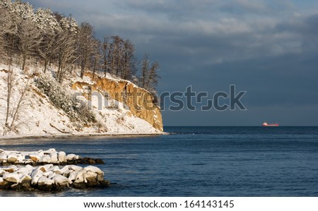 Cliff by the sea in Gdynia in the background ship