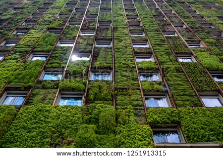 Similar – Foto Bild Gebäude mit spiegelndem Fenster im Abendlicht