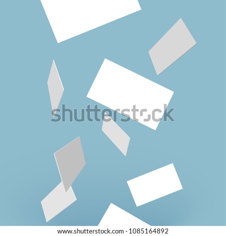 Vector white business cards on transparent background falling from above.