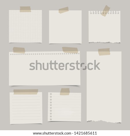 Set of various note papers with adhesive tape.