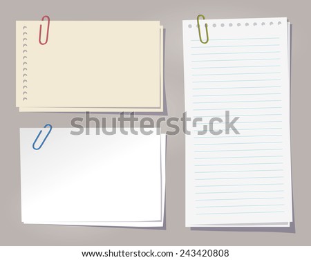 Different sheets of note papers and color paper clips.