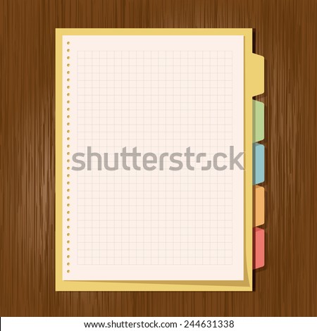 Binder with note paper on wood background.