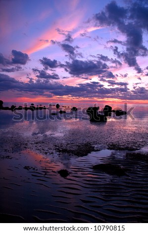 Blue and pink sunset on tidal flat, Cape Cod