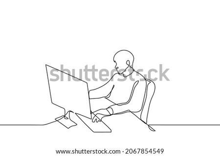 man typing on keyboard in front of computer - one line drawing vector. concept of working at stationary computer; worker at work; freelancer working from home (copywriter, writer, journalist)