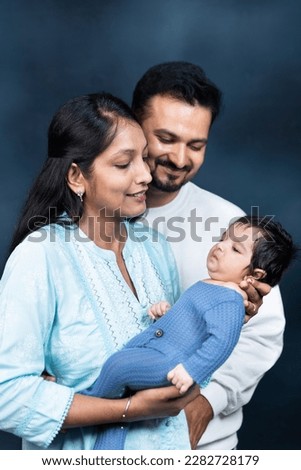 Similar – Image, Stock Photo Little new born girl lying down and trying to relax