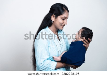 Similar – Image, Stock Photo Young mother hugging her baby