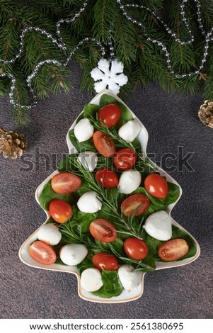 Foto Bild Caprese-Salat auf braunem Hintergrund