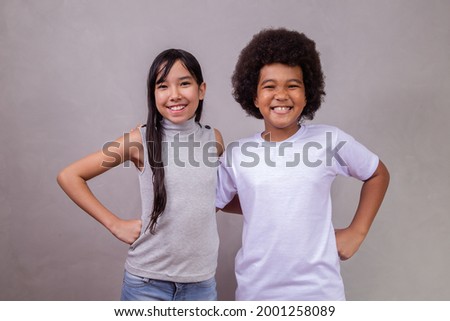 Similar – Image, Stock Photo Little girl, eight years old, sitting on the grass outdoors.