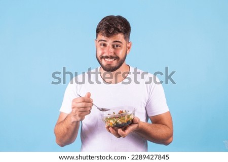 Similar – Image, Stock Photo Handsome young bearded man under the sunset