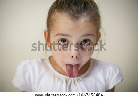 little girl tongue out images - USSeek
