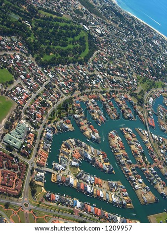 Aerial View of Coastal Town. View of Waterfront Houses