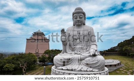 Similar – Image, Stock Photo Buddha sculpture on green nature and buddhist prayer flags