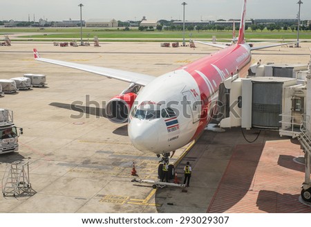 DON MEUNG, THAILAND- JUNE 13, 2015:The air plane of air asia airline that prepare to fly to tokyo city, Thailand. June 13 2015