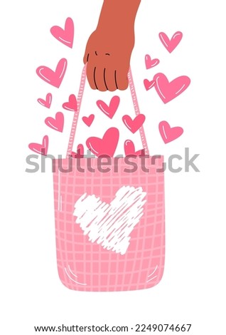 Bag with love. Hand holds a bag with hearts. Happy Valentine's day card. Long awaited purchase