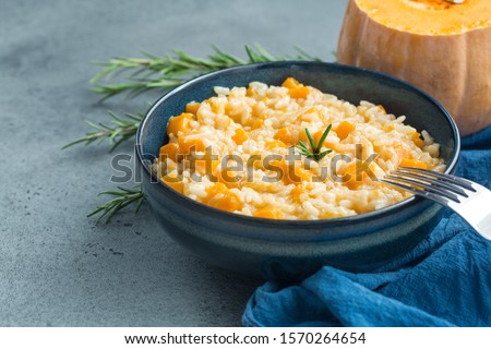 Similar – Rosemary on risotto with rabbit and mushrooms