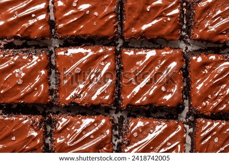 Similar – Image, Stock Photo Brownies cake squares on cooling rack. Chocolate fudge brownies