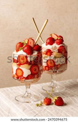 Similar – Image, Stock Photo Strawberries tiramisu on a field of daisies in spring