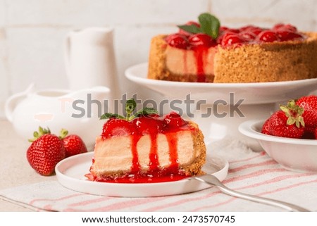 Image, Stock Photo Delicious cheesecake with strawberries on plate