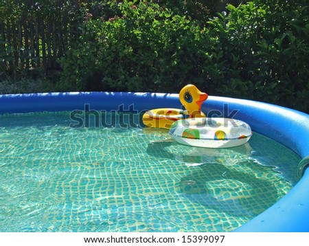 water-pool with toys in the garden