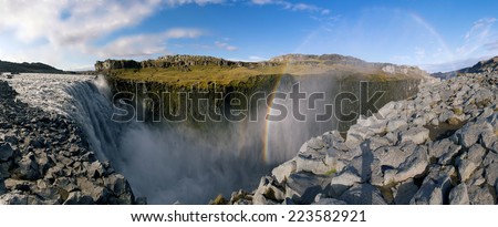 Beautiful panorama picture with a view on icelandic dettifoss waterfall and rainbow in iceland