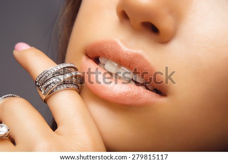 Natural Lips with Diamond Jewelry. Fashion Make-up, Style and Cosmetics