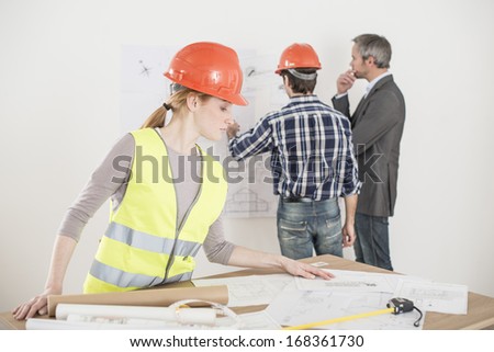 female foreman during a meeting about a build project
