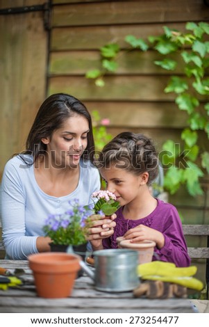 Mother daughter special moment. Gardening discovering and teaching