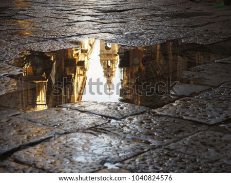 Similar – Image, Stock Photo Reflection of a church tower and houses in the water