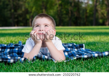 dreaming child on grass