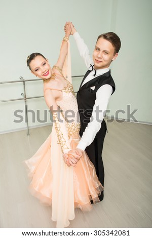Dancing, ballroom dancing, dance studio, man and woman