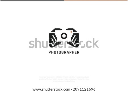 Photographer Logo Design. Vector Logo Template. A smart logomark of two hands holding a DSLR camera in a negative effect. A symbol representing quality portrait, nature, wedding and other photography 