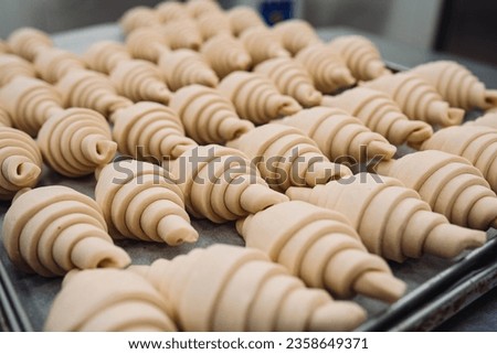 Image, Stock Photo Baker rolling out dough in kitchen