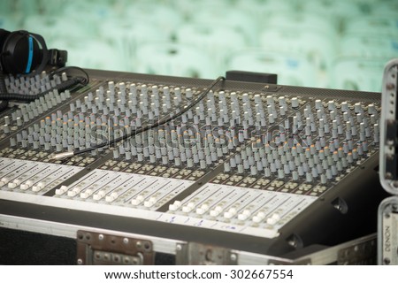 DOF. Large music mixer desk in recording studio