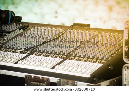 DOF. Large music mixer desk in recording studio