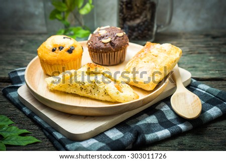 Bakery food place one wood dish wood spoon and green leaves on the old wood table concept the fat that comes from food