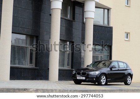 MINSK - JULY 2015: new BMW 1-series 2015 drives at the test drive event for automotive journalists from Minsk