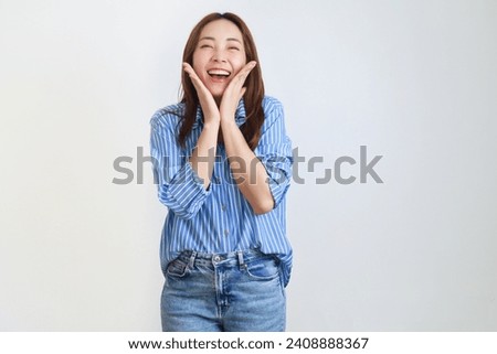 Similar – Image, Stock Photo Young Asian ladies showing V sign and smiling while lying on grass in sunlight