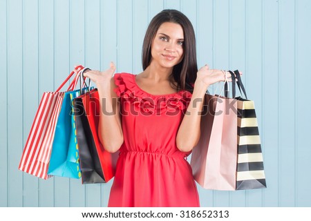 Happy shopping, sale. Beautiful woman with a lot of shopping bags