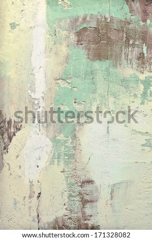 old grungy wall background with cracked paint and spots