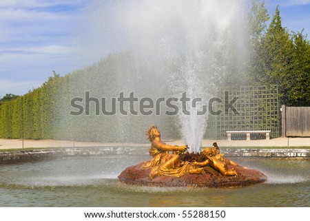 The Ceres (Roman Goddess of harvest and corn) fountain spraying water in Versailles Chateau. France