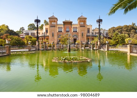 Mudejar Pavilion and pond. Placed in the Plaza de America, houses the Museum of Arts and Traditions of Sevilla, Spain. Built in 1928 for the Ibero-American Exposition of 1929