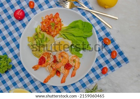 Similar – Image, Stock Photo Grilled spinach fajitas served with cottage cheese and sauce