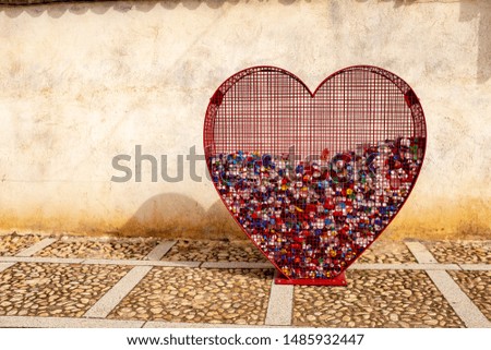 Similar – Foto Bild Am Strand gesammelte Plastikpfropfen.